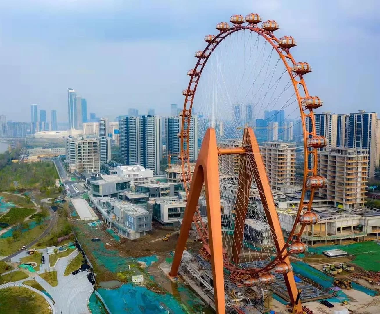 Nanjing observation wheel with orange supports and enclosed capsules