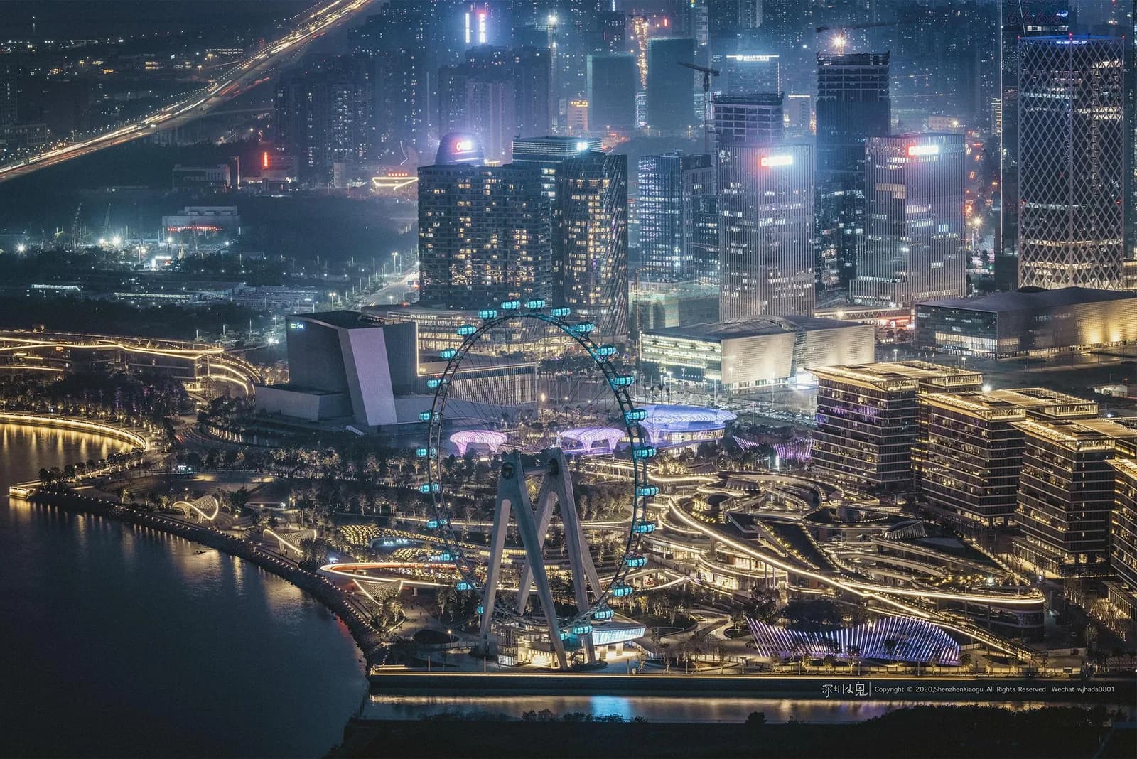 Shenzhen Bay Glory observation wheel beside the illuminated waterfront